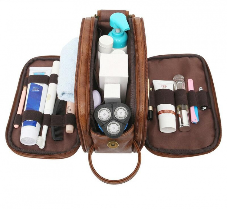 Rummelig rejsetaske i læder